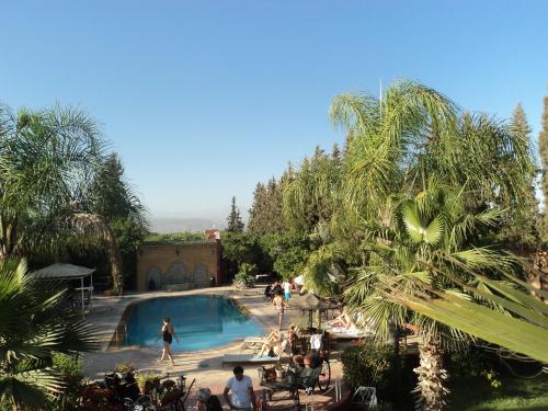 A piscina localizada em Hotel Riad L' Arganier D' Or ou nos arredores