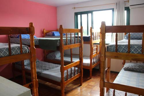 a group of bunk beds in a room at Nosso Lounge Hostel in Florianópolis