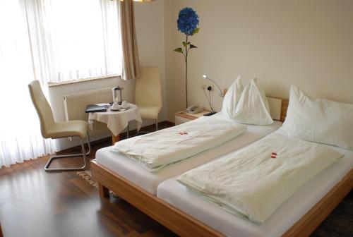 
Ein Bett oder Betten in einem Zimmer der Unterkunft Bärnthaler Gasthof Restaurant
