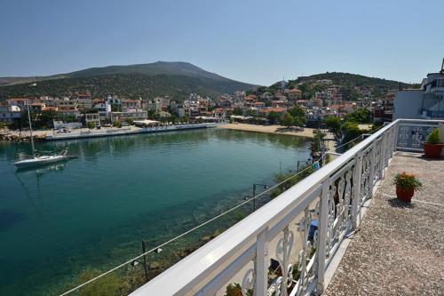 a view of a river from a balcony at To Pithari in Skala Marion