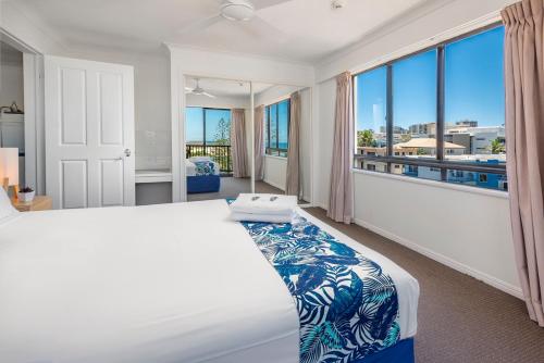 Belaire Place Motel Apartmentsにあるベッド