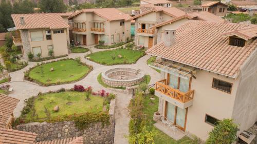 an aerial view of a house with a garden at Intiterra Apart Hotel Villas in Urubamba