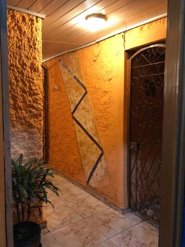 an empty hallway with a door in a building at Hospedaria Nossa Senhora da Glória in Petrópolis