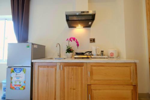 Cucina o angolo cottura di Marigold Hotel & Apartment