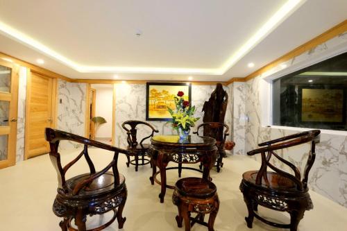 Area soggiorno di Marigold Hotel & Apartment