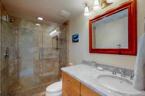 a bathroom with a shower and a sink and a toilet at Park City Paradise in Park City