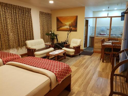 Postel nebo postele na pokoji v ubytování Mahoteak Home Stay