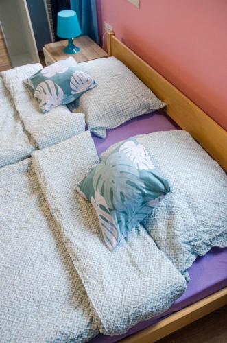 Katil atau katil-katil dalam bilik di Rooms and Apartment Veral-KA