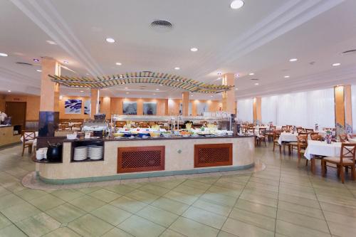 Hotel Obeliscoにあるレストランまたは飲食店
