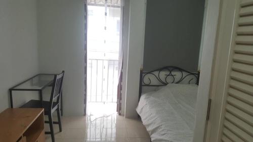 Ένα ή περισσότερα κρεβάτια σε δωμάτιο στο JS mansion