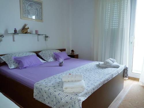 Postel nebo postele na pokoji v ubytování Apartman Kristin