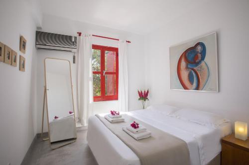 Llit o llits en una habitació de Liora Suite