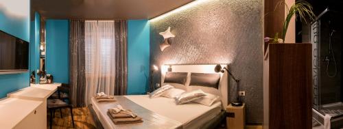 Postel nebo postele na pokoji v ubytování Design B&B Bacvice Arti