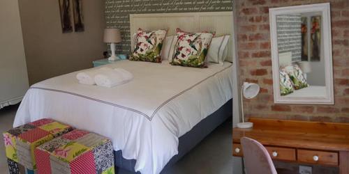 Кровать или кровати в номере Dancing River Guesthouse