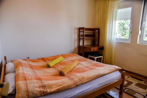 Ένα ή περισσότερα κρεβάτια σε δωμάτιο στο Apartment Jasovic