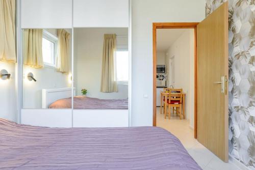 Katil atau katil-katil dalam bilik di Sea Suites