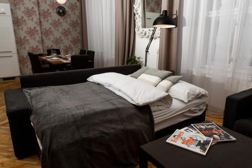 Postel nebo postele na pokoji v ubytování Exclusive Old Town Apartments