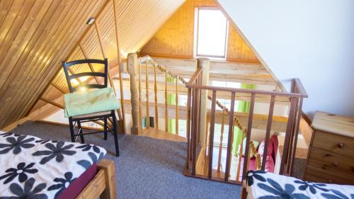 Postel nebo postele na pokoji v ubytování Ferienhaus Elbtalaue