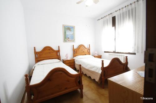 Ένα ή περισσότερα κρεβάτια σε δωμάτιο στο Villa Lyna