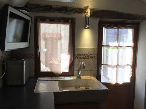 Vonios kambarys apgyvendinimo įstaigoje La Galisesagnoise
