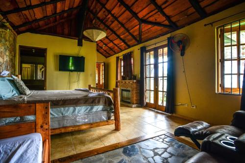 Giường trong phòng chung tại Villa Sueño Alcanzado