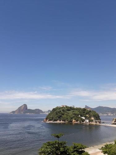 an island in the middle of the ocean at Brasileranza Hostel in Niterói