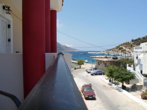 a view of a street from a balcony of a building at Costareli in Fourni Ikarias