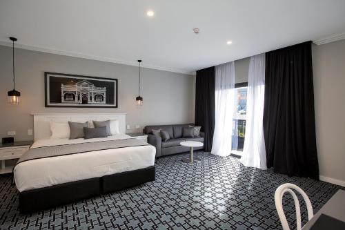 CH Boutique Hotel & Apartments, an Ascend Collection Hotelにあるベッド