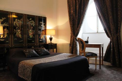 Postel nebo postele na pokoji v ubytování Résidence et Chambres d'Hôtes de La Porte d'Arras