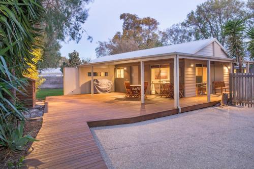a modular home with a deck and a house at Boardwalk in Quindalup