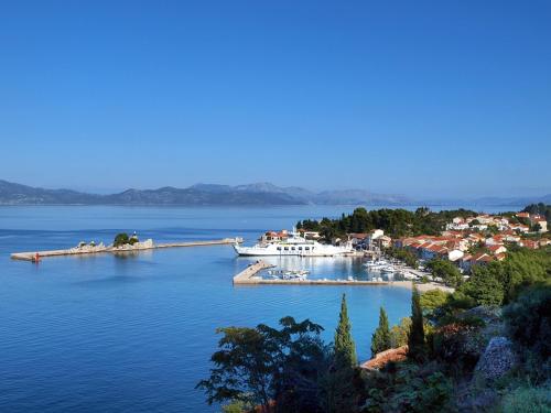a small island in the middle of a large body of water at Apartment Ida in Trpanj