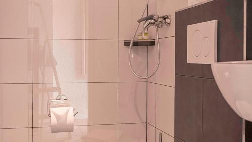 a bathroom with a shower and a sink at Fewo Schächtelschleif in Waldmünchen