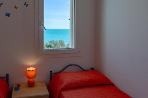 Cama o camas de una habitación en Lumia Case Vacanze