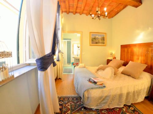 Ένα ή περισσότερα κρεβάτια σε δωμάτιο στο Lucca Retreat with Pool