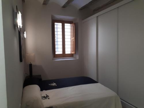 Кровать или кровати в номере Amplio apartamento en centro histórico