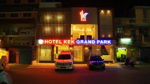 two police cars parked in front of a hotel key grand park at HOTEL KEK GRAND PARK in Chennai