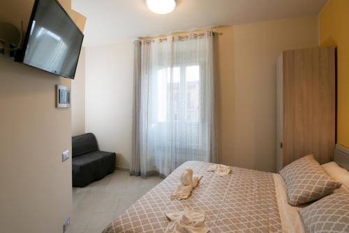 Letto o letti in una camera di La Madonnina