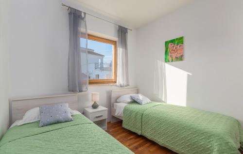 Postel nebo postele na pokoji v ubytování Apartmani Katalin