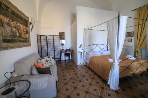 Giường trong phòng chung tại Palazzo Barba
