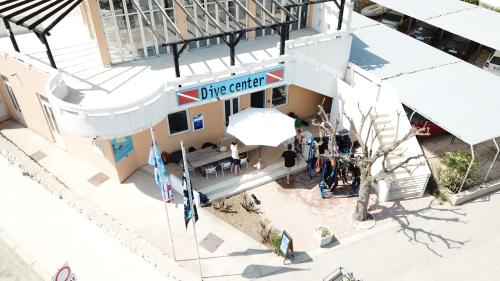 an overhead view of a wine center building at Apartments Capic in Baška