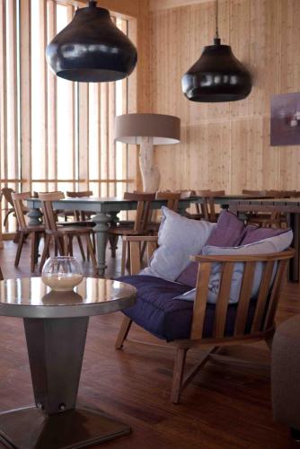 Et opholdsområde på L'Aiguille Grive Chalets Hotel