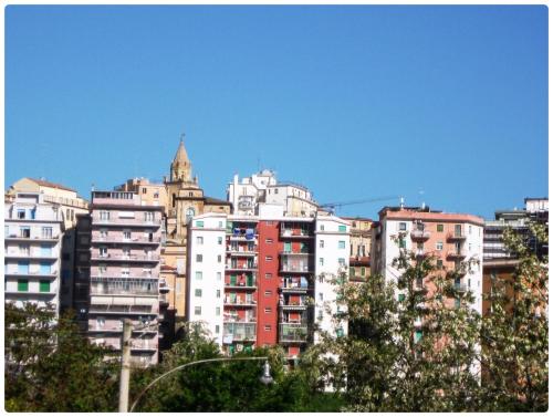a group of tall buildings in a city at Tra mare e monti in Chieti