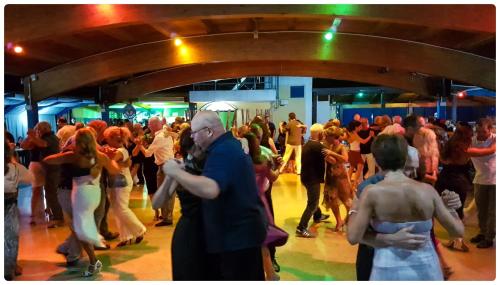 a group of people dancing at a party at Tra mare e monti in Chieti