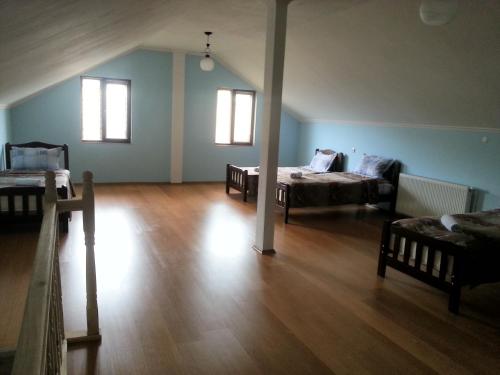a living room with two beds and a couch at Old Town Akhaltsikhe in Akhaltsikhe