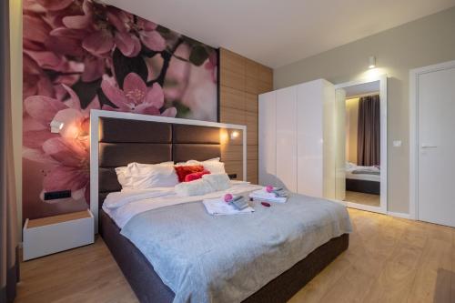 A bed or beds in a room at Vitosha Boulevard Two Bedroom Two Bathroom Lux Suite