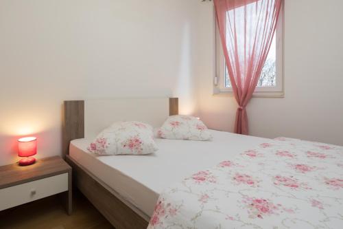 Posteľ alebo postele v izbe v ubytovaní ARIJANA APARTMAN free private garage