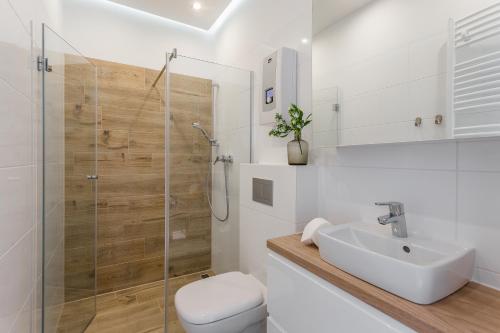Ванная комната в Central Apartments Piwna