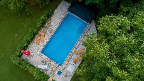 an overhead view of a swimming pool in a yard at Vila Andrea in Danilovgrad
