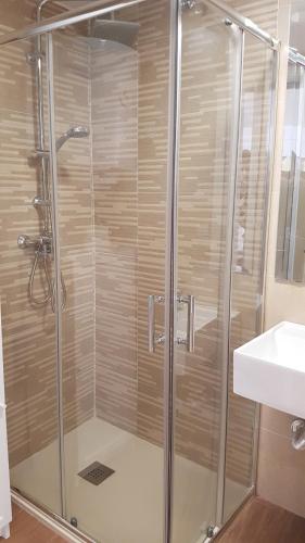 Et badeværelse på Apartment Plaza Del Salvador