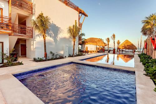 Bazén v ubytování Mystique Holbox by Royalton, A Tribute Portfolio Resort nebo v jeho okolí